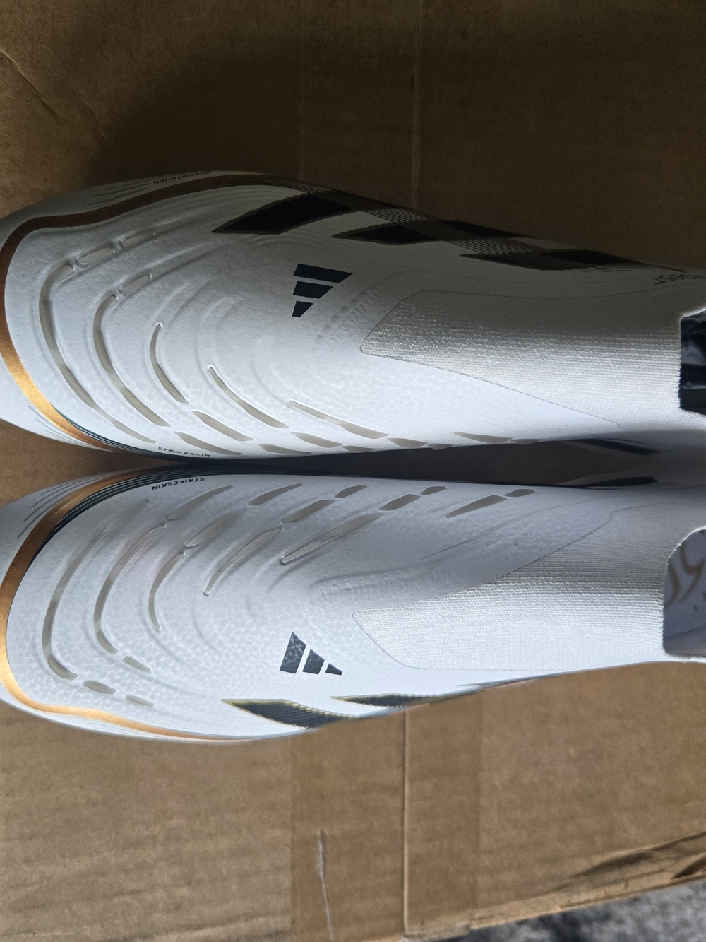 Adidas Men's White Soccer Cleats with Black Accents